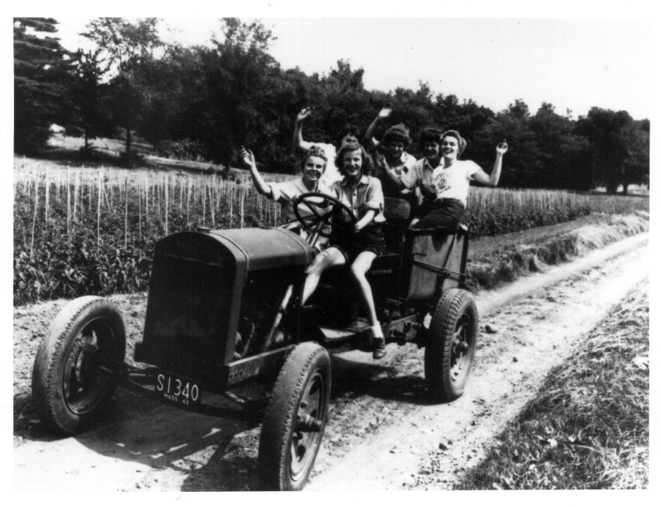 Women Students on Farm Vehicle