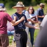 Geunhwa Jung informs visitors about management strategies for turfgrass diseases 