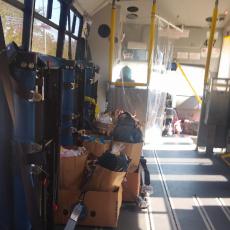 Seats removed from RTA van to accommodate bags of food for delivery
