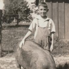 Merle Howes as 11 year old 4-H member on his family farm