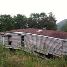 Mobile home sustained damage from Hurricane Irene