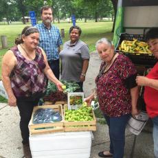 Shoppers at mobile market in Springfield, July 2016