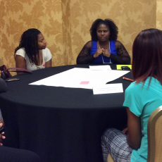 Vanessa Ford facilitates roundtable discussion at national conference as part of her breastfeeding research