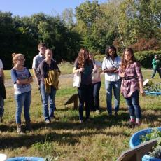 Summer intern, Cassie Sefton leads tour of Ag Learning Center