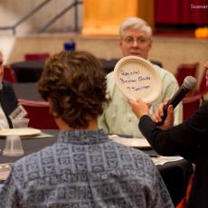 Thayer Tomlinson engages participants in discussion