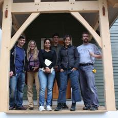 Students with Simi Hoque, on a field study to test                    Diagram for city modeling tool including inputs  the energy conservation strategies of a local building