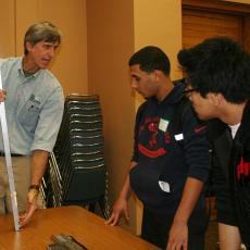 Al Averill shows students soil sampling techniques