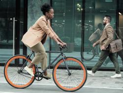 woman riding bike to work