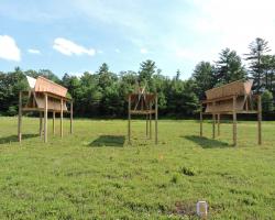 a pilot project using plywood sheets as stand-ins for solar panels will be providing preliminary data on how shading from solar arrays could affect canopy microclimate, plant physiology, yield, and fruit quality. The experiment is set up over a site populated with the ‘Stevens’  cultivar. 