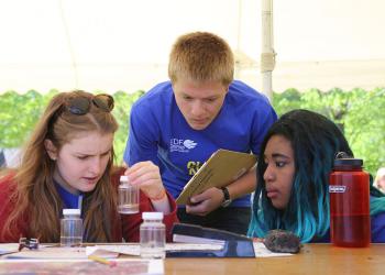 Students examine water at MA Envirothon