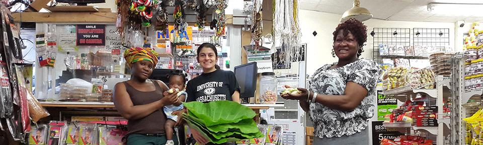 Zoraia Barros,UMass Amherst with latest produce at Worcester's Monrovia African Market